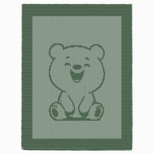 May include: A light green baby blanket with a smiling bear design. The bear is outlined in dark green, with details like the eyes, nose, and mouth visible. The blanket has a dark green border.