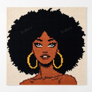 May include: A white ceramic mug with a black handle and the text "But First, Coffee" in a black, handwritten-style font. The mug is on a white surface.