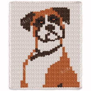 May include: A rectangular knitted textile featuring a pixelated graphic of a boxer dog. The dog has a brown, white, and dark brown coat with a distinct facial mask. The background is a light cream color, and the knit texture is clearly visible.