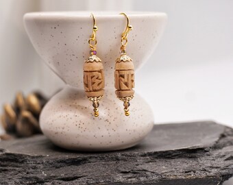 Orecchini Radhe in oro fuso