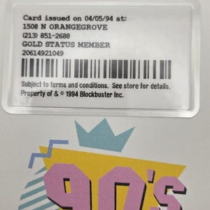 May include: A Blockbuster membership card with blue and yellow branding, featuring text including 1508 N ORANGEGROVE, GOLD STATUS MEMBER, and a barcode. Below is a graphic with a yellow triangle, a crown, and the text 90'S FOREVER in pink.