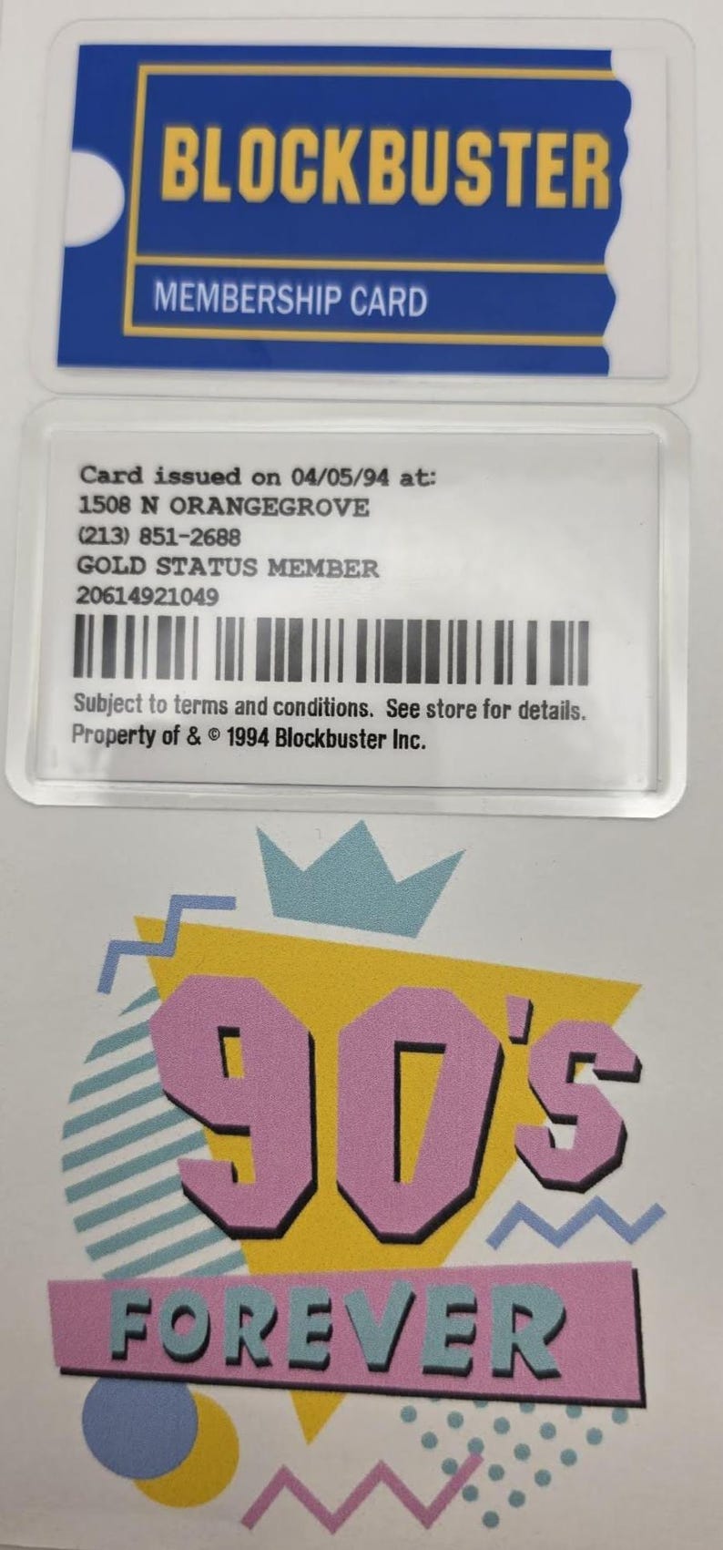 May include: A Blockbuster membership card with blue and yellow branding, featuring text including 1508 N ORANGEGROVE, GOLD STATUS MEMBER, and a barcode. Below is a graphic with a yellow triangle, a crown, and the text 90'S FOREVER in pink.