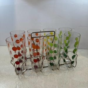 Awesome 1950s Set of 8 MCM Atomic Multi Colored Polka Dot Drinking Glasses with Metal Carrier