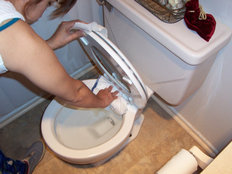 Potty training-boys training urinal-gives them the confidence they need in their aim-plastic shield clips on the toilet rim-funnels it down image 5