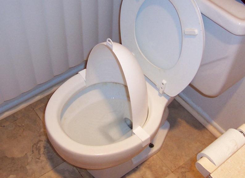 Potty training-boys training urinal-gives them the confidence they need in their aim-plastic shield clips on the toilet rim-funnels it down image 4