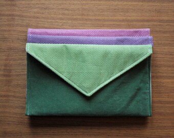 Small green envelope-style clutch/handbag made in Quebec from recycled and recovered materials