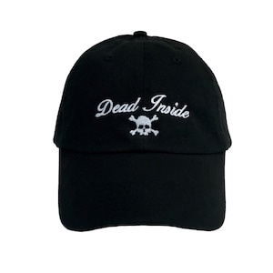 May include: Black baseball cap with white embroidery that reads "Dead Inside" with a skull and crossbones graphic.