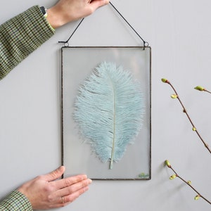 Ostrich feather in stained glass frame, burlesque window hangings, framed blue feather, minimalist wall decor