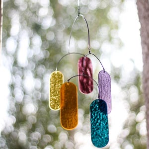 Oval mobil solfångare i målat glas, flytande fönsterhängande dekoration