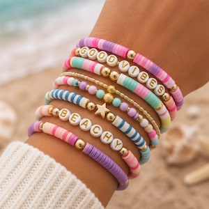 Clay Bead Bracelets Stack bracelets, 4 Mystery Stretch Bracelets, 2 Free Stickers