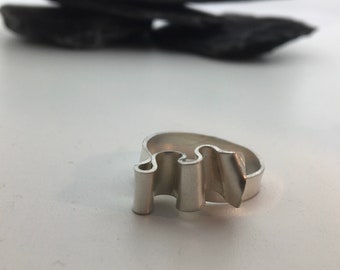 Wavy adjustable hammered silver handmade ring