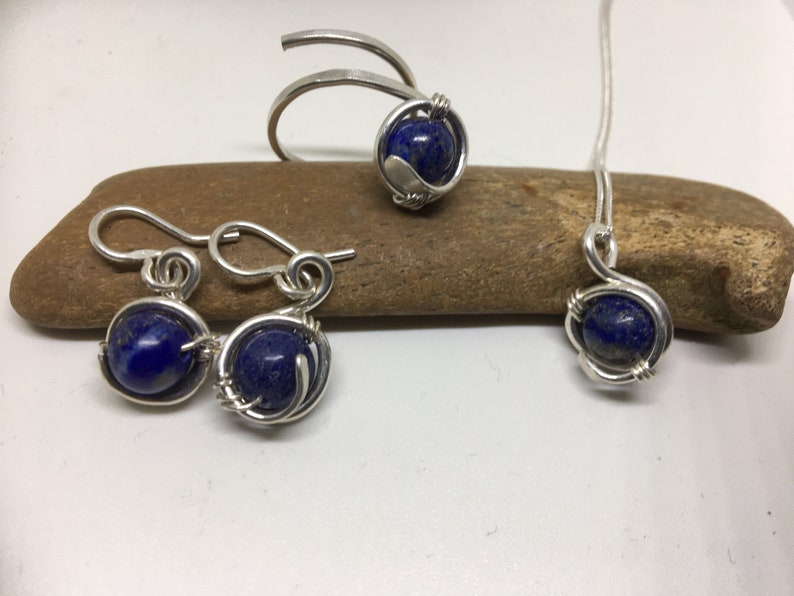 Lapis lazuli stone wrapped with silver handmade earrings