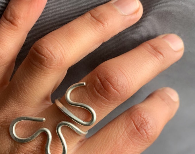 Handmade adjustable sterling silver flower ring