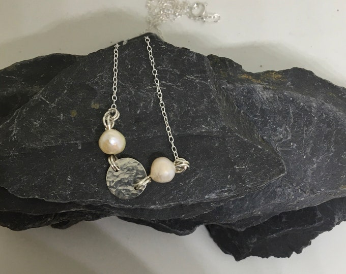 Pearl and hammered sterling silver disk pendant