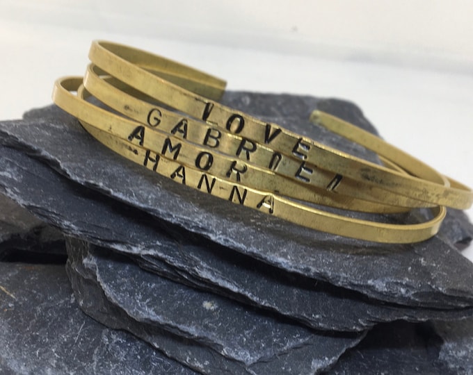 Hand stamped personalised brass brazalets