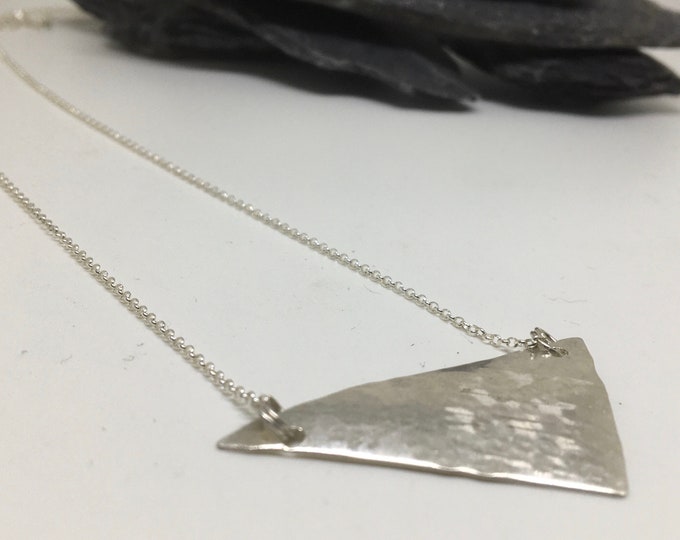 Triangular hammered silver handmade pendant