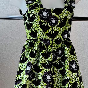 robe en wax , glissière sur le côté.