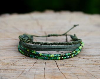 Armband multi strijkers, met vlecht, kralen en sterren charme, groene katoenen touw en valse groene Zweeds, kralen.