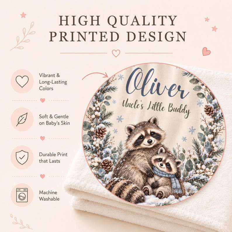 May include: A white baby blanket featuring a circular graphic of two raccoons in a winter forest setting. The text reads Oliver and Uncle's Little Buddy. The design includes pine branches, pinecones, and snowflakes. The image also displays text stating High Quality Printed Design, Vibrant & Long-Lasting Colors, Soft & Gentle on Baby's Skin, Durable Print that Lasts, and Machine Washable.