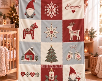 May include: A rectangular throw blanket featuring a grid of twelve embroidered Christmas-themed squares. Designs include a gnome, snowflake, the name Emma with a heart, a Dala horse, star, reindeer, house, tree, mittens, hearts, candle, and a gnome with a rabbit.