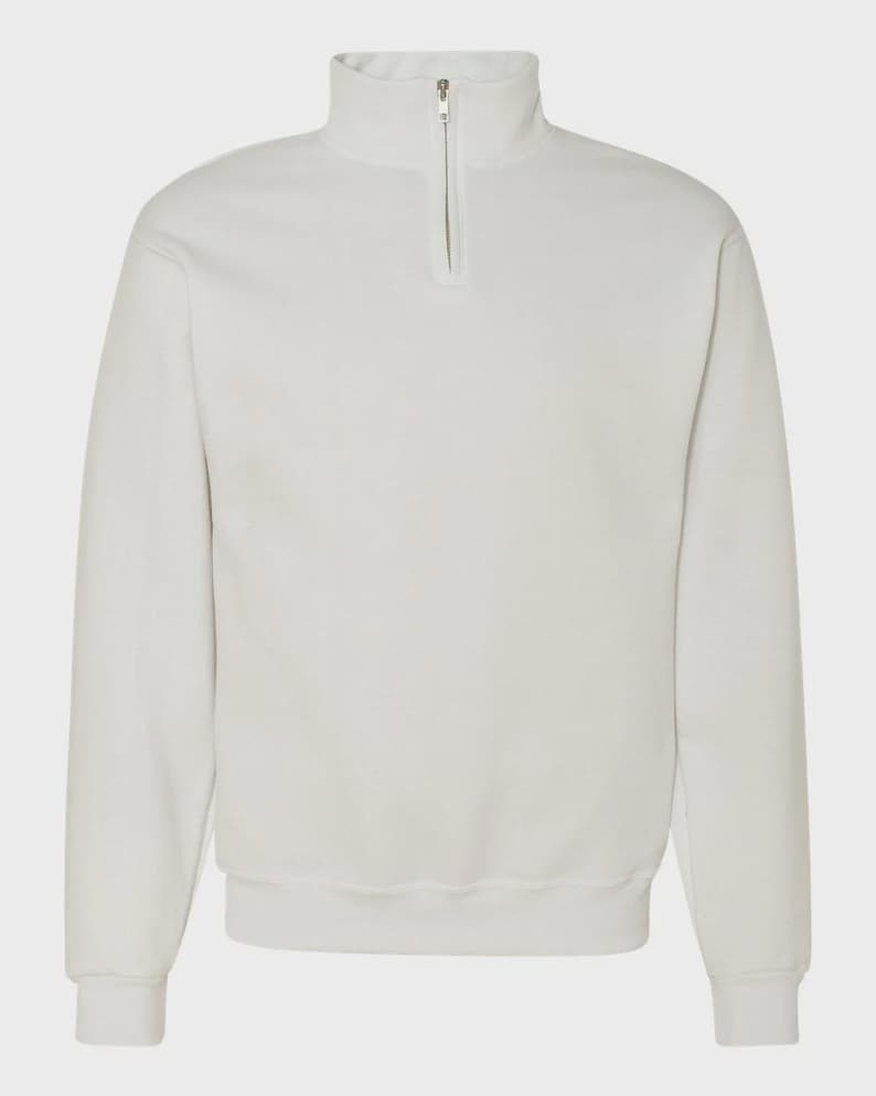 May include: A light gray long-sleeve sweatshirt featuring a mock neck collar with a silver-toned metal zipper closure. The garment has ribbed cuffs at the wrists and a ribbed hem at the bottom, providing a structured fit with a clean, solid-colored finish.