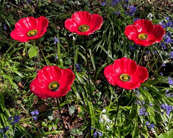 Set Of Five Cast Iron Poppy Shaped Bird Feeders