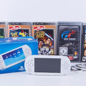 Sony Playstation PSP E1004 Street 4,3 Consola (2011) con 60 giochi e  accessori - Shopping.com