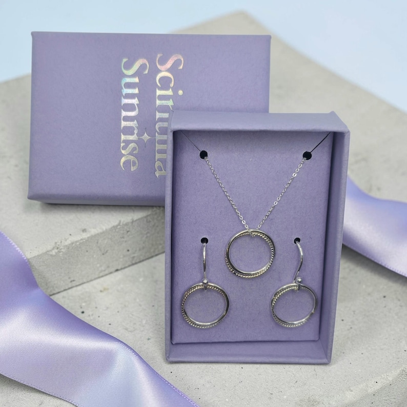 Sterling silver double circle pendant and earrings gift set, presented in branded Scintilla Sunrise gift box
