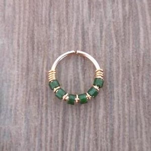 Cartilage earring dark green made with 14K gold filled wire and glass beads in the UK