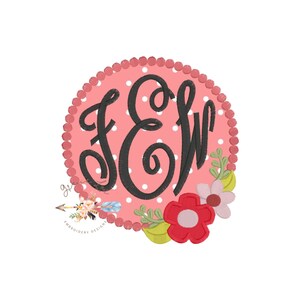 May include: A pink circle with white polka dots and a black monogram "FEW" in the centre. The circle is surrounded by a beaded border and decorated with green leaves and pink flowers.
