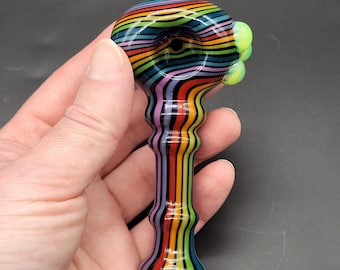 Rainbow Pinstripe Glass Spoon Pipe on Cobalt Blue