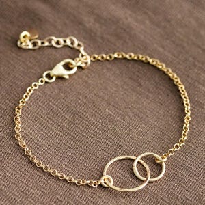 Armband mit verschlungenen Ringen vergoldetes Silber | Goldenes Doppelkreis-Armband
