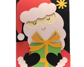 Weihnachtskarte Santa mit Geschenk