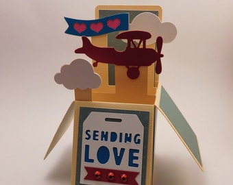 Sending love, airplane pop up box card