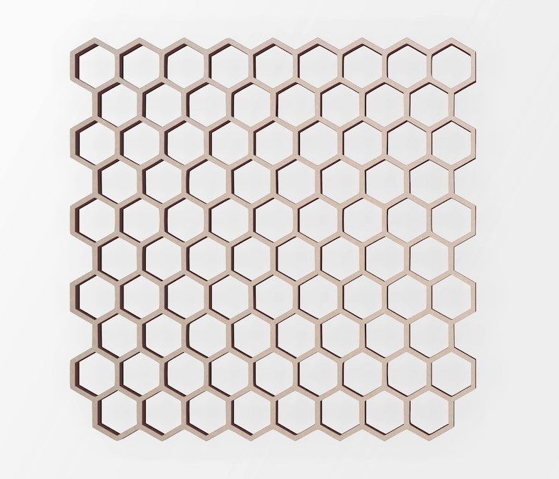 May include: A wooden honeycomb shelf unit with a light brown finish. The shelf unit is made of individual hexagonal compartments.