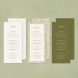 May include: A set of menu cards in white and green, with a floral pattern. The cards list menu items for starters, main courses, and desserts. The text includes dishes such as roasted beet salad, chicken, and risotto.