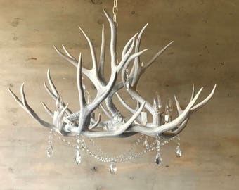 Antler Chandelier adorned with Crystals   32" x 22"