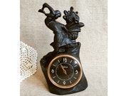 Old mantel clock Antique clock figure Metal table clock 60s Vintage clock sculpture Rare mechanical clock Cast iron mantel clock Desk clock