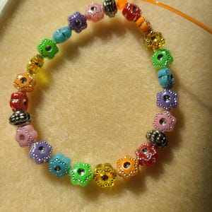 Tiny rainbow flower bracelet