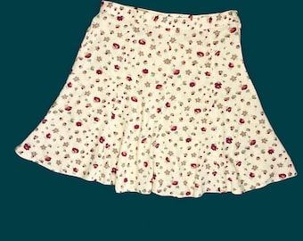 Minifalda amarilla con estampado floral estilo años 90 de Nueva York
