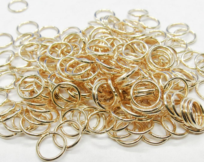 750 KC Gold Plated Opened Jump Rings 4mm x .7mm  (A262c)