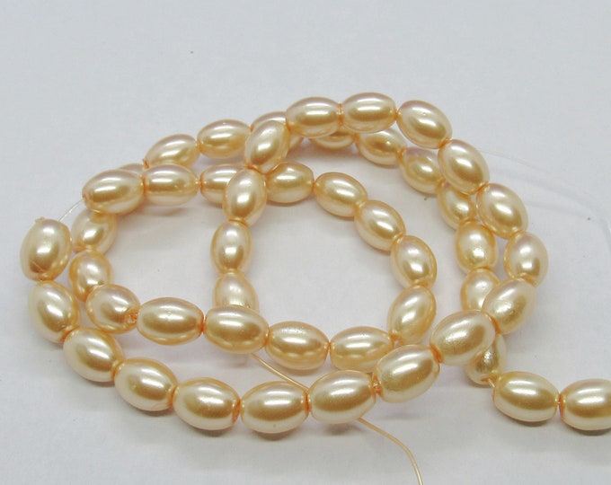 1 Strand 8x6mm Peachy Yellow Oval Glass Pearl Beads (A15j)