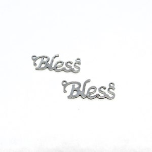 May include: Two silver metal charms with the word "Bless" written in a cursive font.