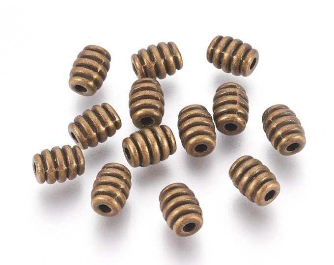 50 Antique Bronze Tone Barrel Spacer Beads 7x5.5mm  (A366J)