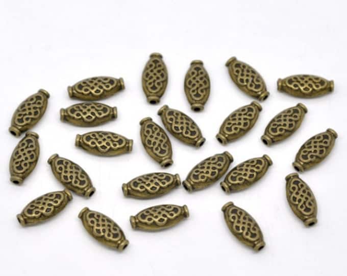 20 Antique Bronze 15x7mm Carved Oval Alloy Spacer Beads  (A273j)