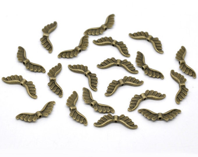 25 Antique Bronze Tone 24x8mm Alloy Angel Wing Spacer Beads (A221g)