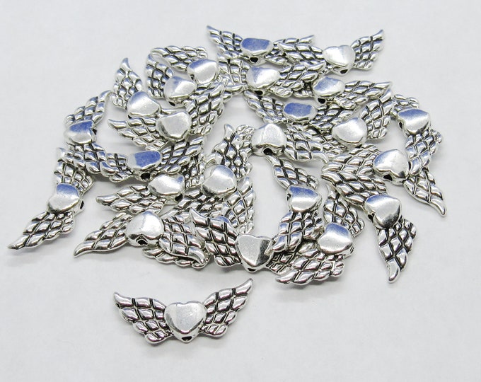 25 Antique Silver Tone 22x9mm Alloy Angel Wing w/Heart Spacer Beads (A203v)