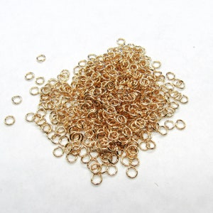 500 KC Gold Plated Opened Jump Rings 4mm x .7mm  (A96f)