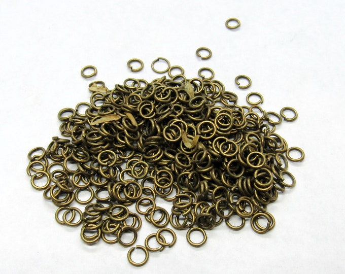 600 Antique Bronze Tone Opened Jump Rings 4mm  (A28h)