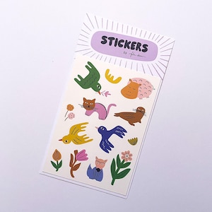 Stickervel schattige dieren en bloemen, handgetekende stickers